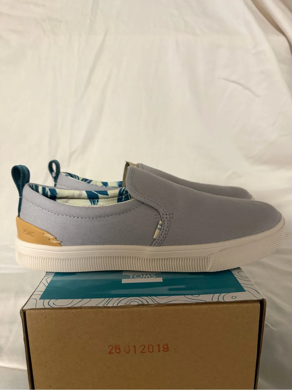 Toms Women’s Slip-On Sneakers in Light Gray and Cream Sole